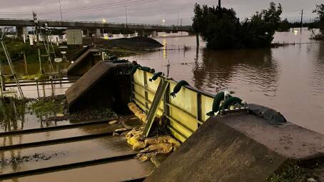 CLOSED: The flood gates at Maitland Station are helping lessen the spread of flood water. Picture: Transport for NSW.