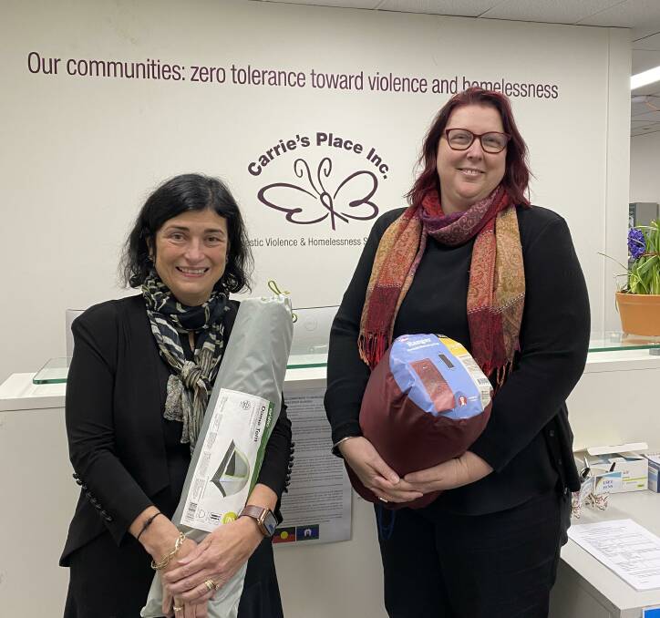 DOING THEIR BEST: CEO of Carrie's Place Jayne Clowes and program manager for specialist homelessness services Ange Kiley with tents and sleeping bags that they are giving out because they have no available accommodation. Picture: Supplied.