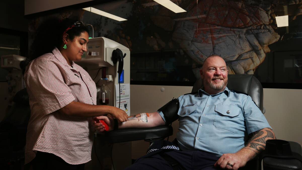 Enrolled nurse Shoba Alexander with Port Stephens Hunter Police District sergeant Adam French at Maitland Donor Centre. Picture by Simone De Peak.
