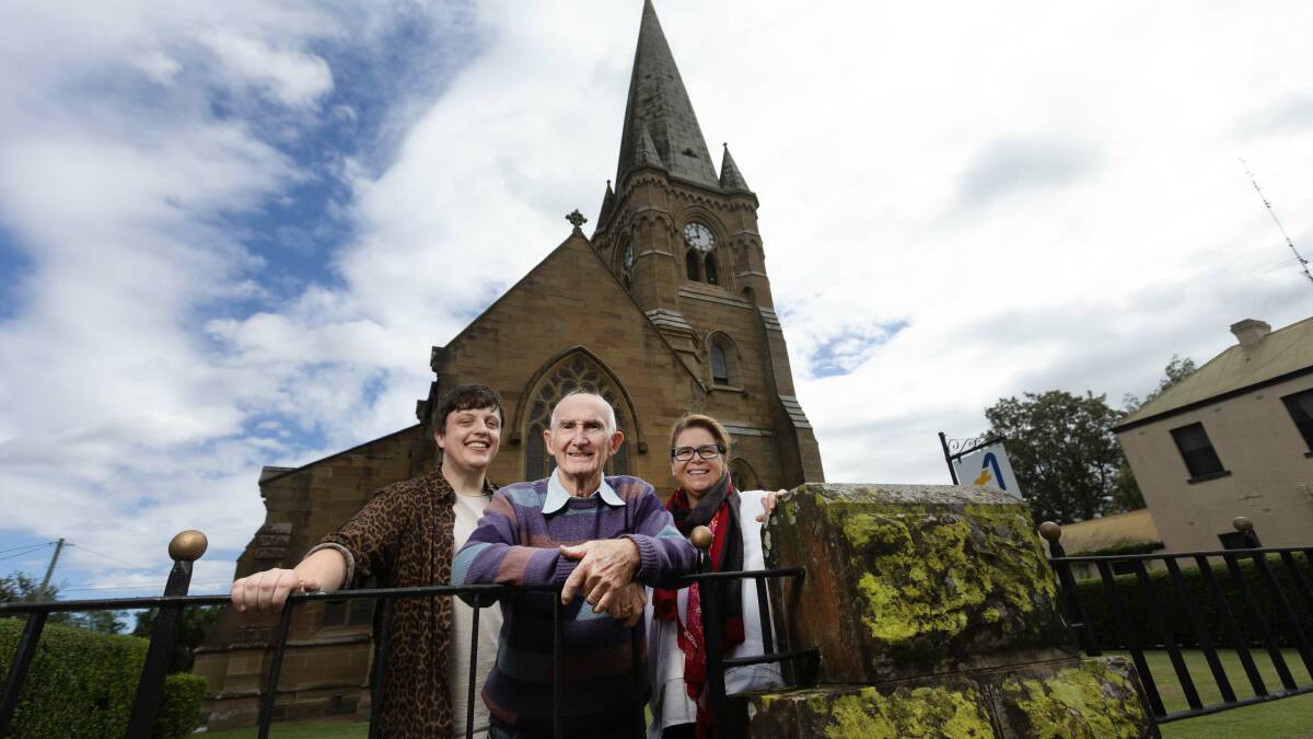 St Mary's Anglican Church volunteer Michael Thorne, clock carer John Hamilton and reverend Sarah Dulley outside the church. Picture by Marina Neil