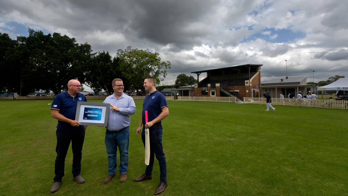 Cricket NSW's Gary Fisher (left) and David Winiata with Maitland mayor Philip Penfold (centre) at Robins Oval. Picture by Jonathan Carroll