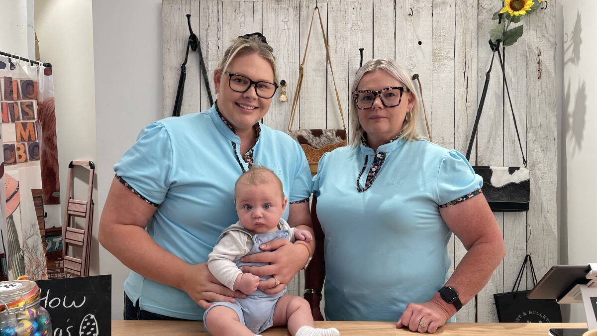 Dust and Bullets Western owner Abby Wilson, her son four-month-old Parker Burrows and her mum Green Hills store manager Tanya Watts. Picture by Chloe Coleman