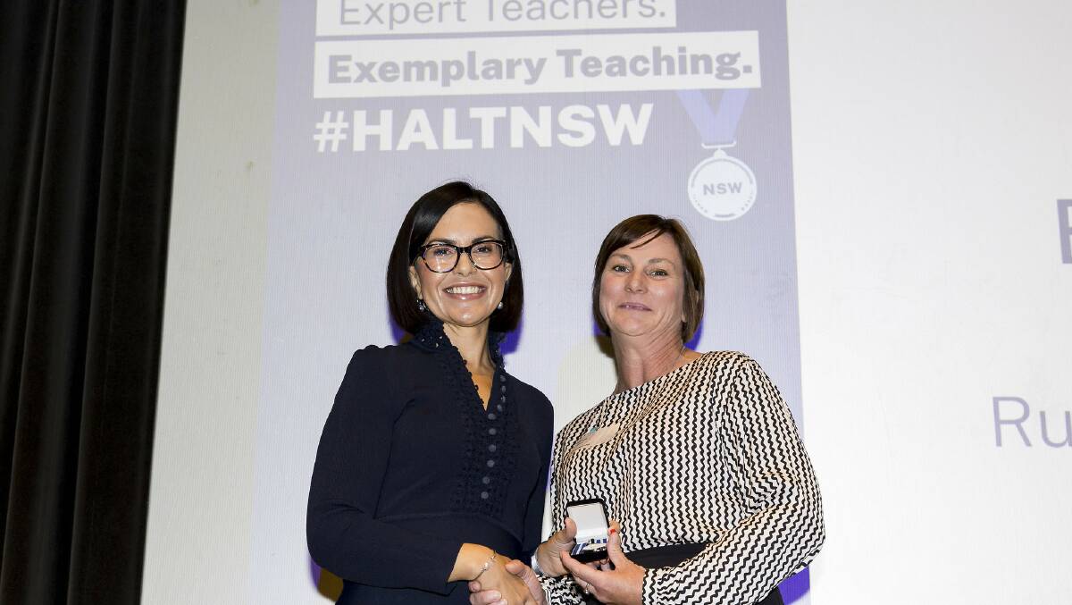 Rutherford Public School assistant principal Belinda Lantry receiving her HALT medal from Minister for Education Prue Carr. Picture supplied