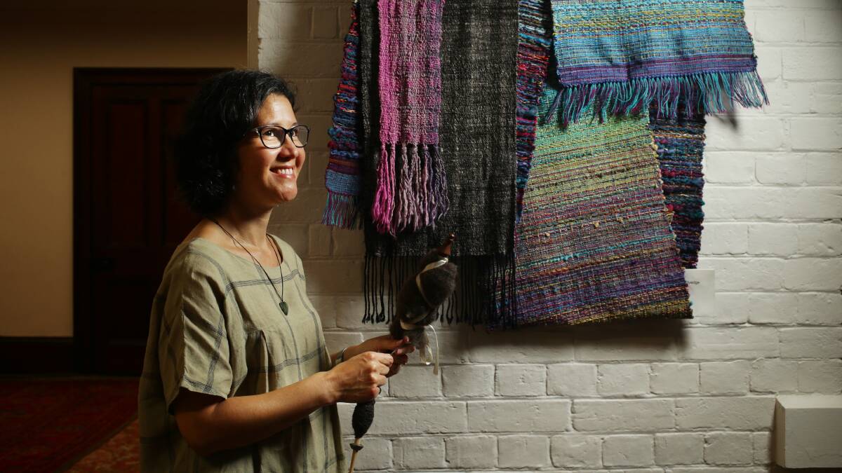 Vicki Cornish in the Brough House fibre makers' space, holding a yarn spinner. Picture by Simone De Peak.