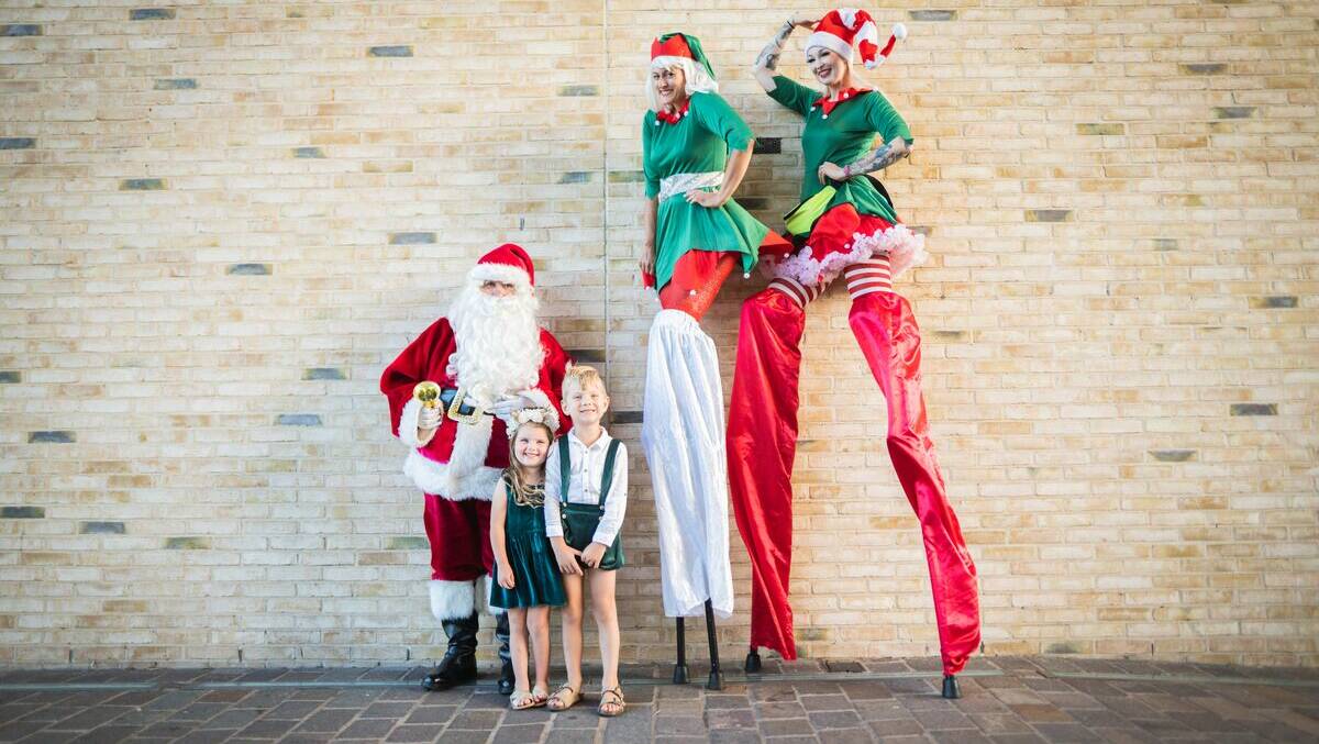 Keep an eye out for the giant green present wrapped with a red bow at The Riverlink - that's where you will find Santa ready to take family photos. Picture supplied.