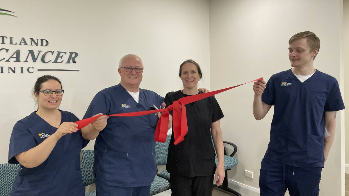 Nurse Hariklia Nadiotis, owners Glenn Brummitt and Dr Anna Brummitt, and their son and laser technician Harry Brummitt cut the ribbon on the clinic's first day at Johnson Street on July 24, 2023. Picture by Chloe Coleman