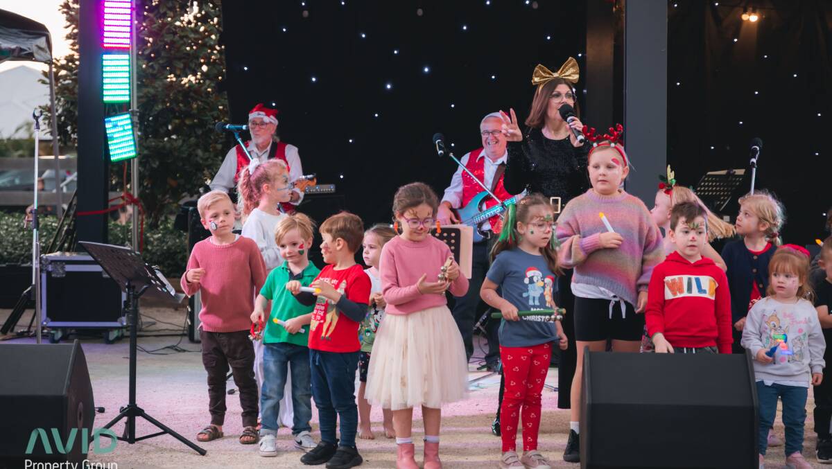 Deb on stage at Waterford Living by AVID Property Group's 2022 Christmas Carols. Picture supplied.