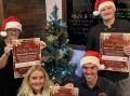 Imperial Hotel staff members Rhonda Clark Abby Carroll, Sam Ariel and Sam McMillan get into the Christmas spirit. Picture supplied