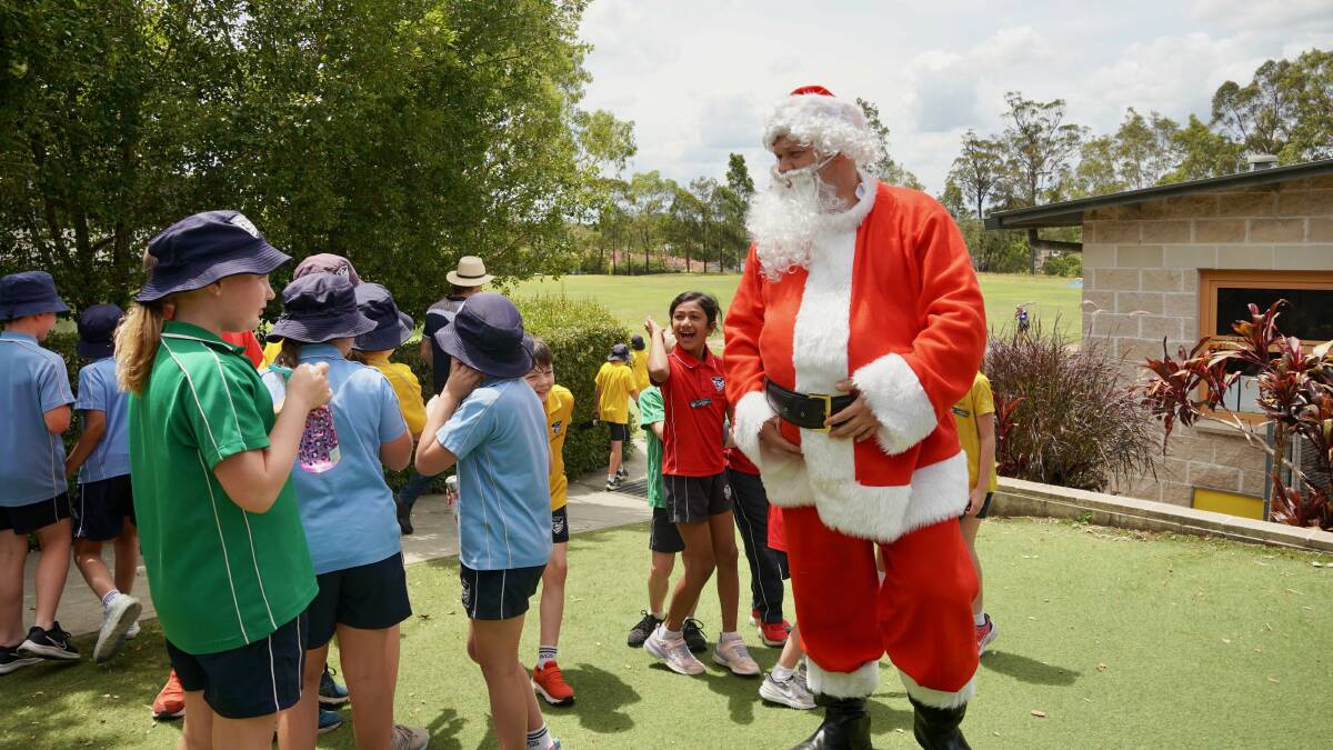 CHRISTMAS: There was a lot of excitement and smiles at Hunter Valley Grammar School following a visit from two very special visitors this holiday season. 
