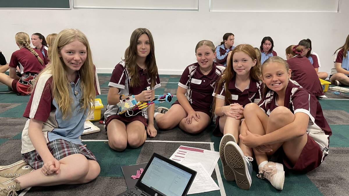 Khalia, Holly, Lexi, Emillie and Lilli work together on the design of a bionic prosthetic limb at Rutherford Technology High School. Picture by Laura Rumbel