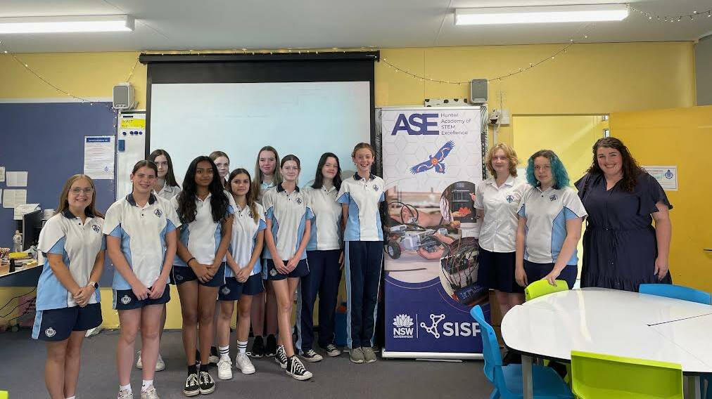 Year 8 students at Maitland Grossmann High School take part in the Orbispace Initiative. From left, Monique Purcell, Jorja Lorenz, Akshara Boby, Emily Armstrong, Kyarla Pacey, Rosie Davies, Emily Maskell, Gabby Campbell, Makaela Grainger, Grace Thornton, Rochelle James, Erica Colquhoun and Ellen Macdonald. Picture by Laura Rumbel 