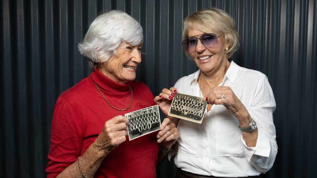 Rowan Pope (left) and Judy McLeod (right) were school captain and vice captain at Maitland Girls High School in 1958. Picture by Marina Neil

