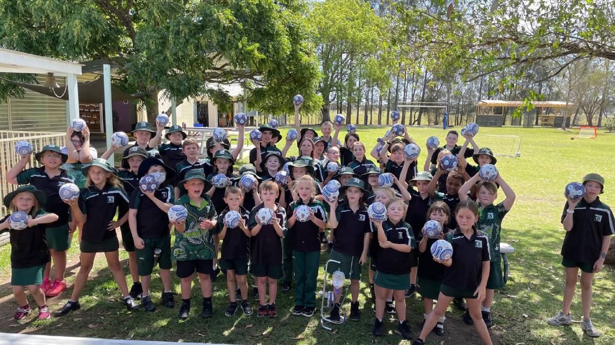 Millers Forest Public School freshens up their soccer skills with visit from Newcastle Jets. Picture supplied