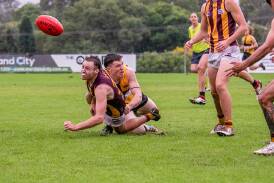 Maitland's Zack Stewart lays a tackle in the Saints Black Diamond clash with Cardiff at Max McMahon Oval on Saturday, April 20. Picture by Milly Hooper Photography