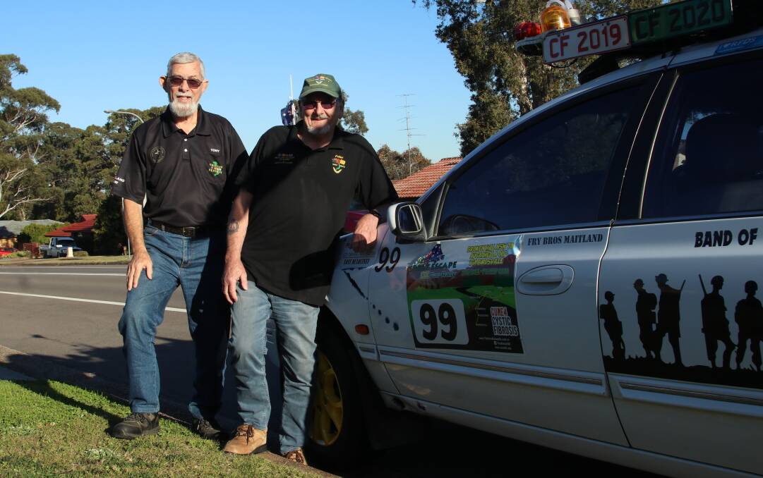 Tony MulQuiney (left) and Peter Margetts start the CF Cure Great Escape car rally on Saturday, August 12. Picture by Ben Carr