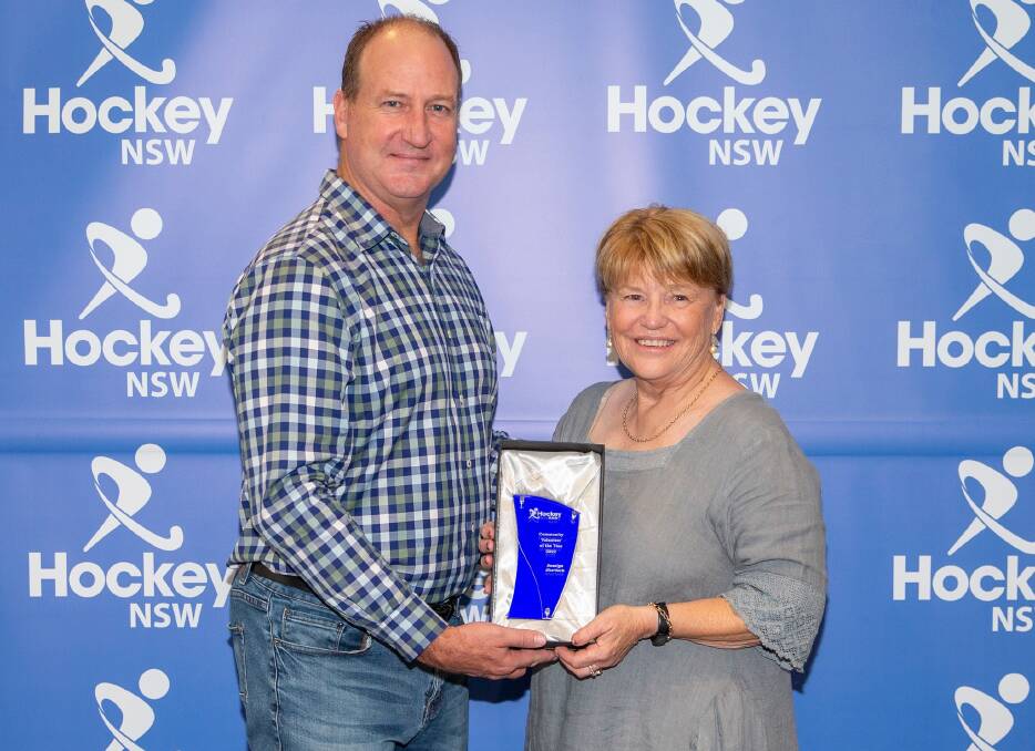 Ros Sherlock receives her Community Volunteer of the Year award at the Hockey NSW Annual Awards held in Newcastle on Saturday night. Picture Supplied 