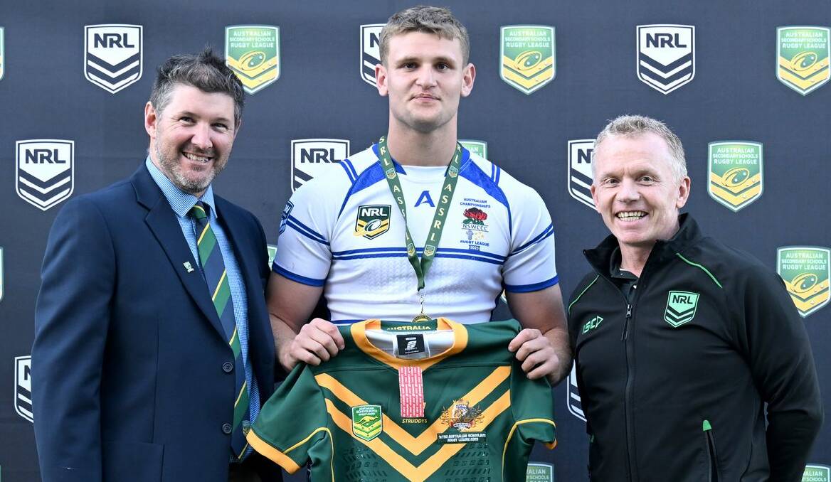 Cody Hopwood receives his number 15 jumper after selection in the Australian Schoolboys side. Picture by NRL