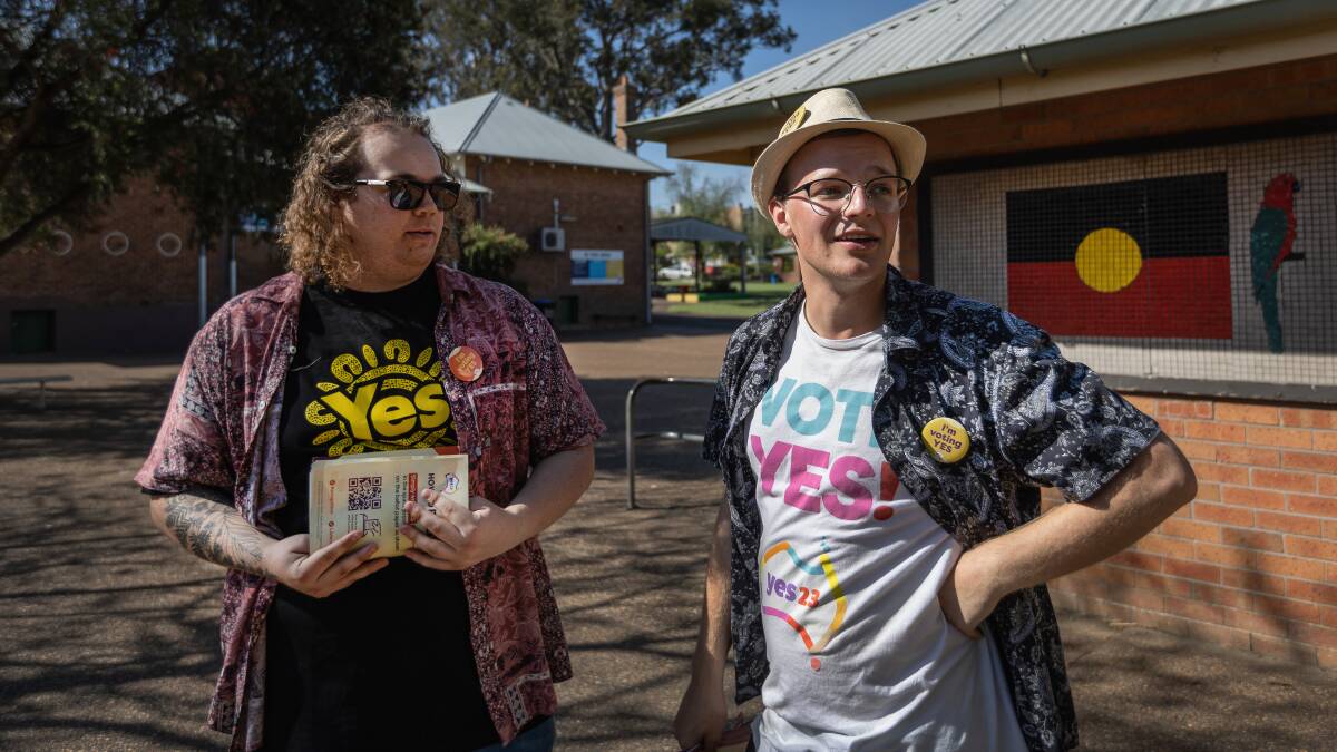 Yes campaigners Macauley Blissett and Campbell Knox at Kurri Kurri Public School polling booth on Saturday, October 14. Picture by Marina Neil