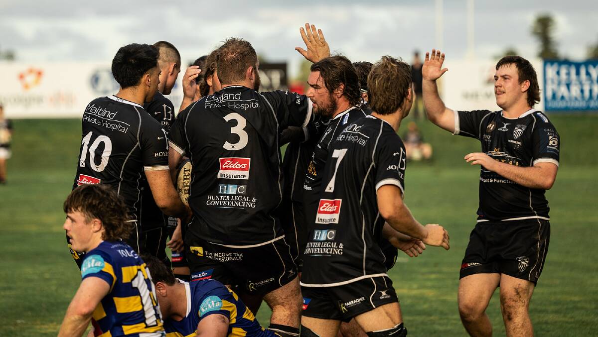 The Maitland Blacks celebrate a try against Southern Beaches in Hunter Premier Rugby on Saturday, May 13 at Marcellin Park. Picture by Maitland Blacks