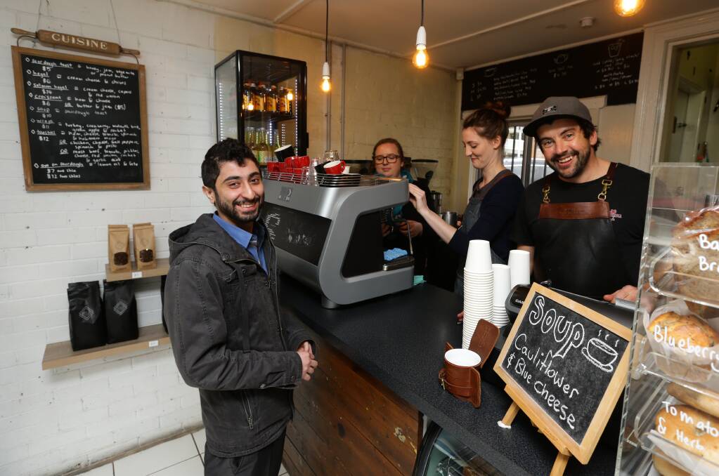 Black Label team: Jess Rinkins, Amy Noone and Mathew Collett serve a customer. Picture: Jonathan Carroll