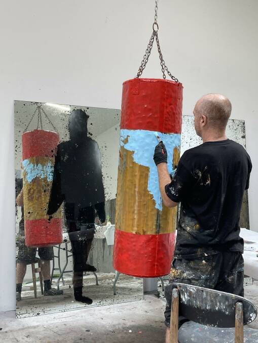 Richard Lewer in his studio creating the installation 'Skill, Discipline, Training' 2021.