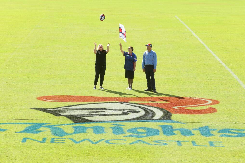 FOOTY: Maitland events officer Portia Wendt with Maitland Mayor Loretta Baker and groundskeeper Brian Worboys.  Picture: Jonathan Carroll