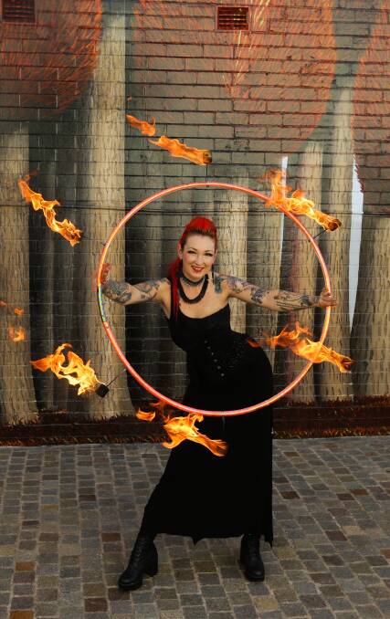 LIGHT UP: Fire twirler Hannah Indigo will be performing at the After Dark - Solstice on Saturday night. Picture: Jonathan Carroll