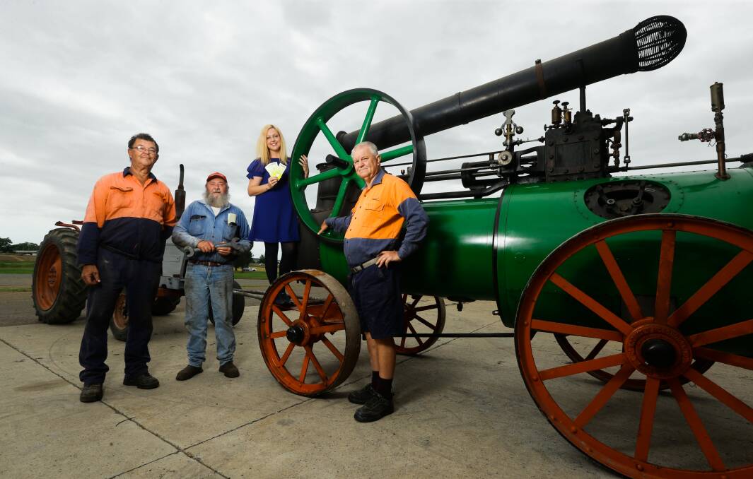 FUN: Steam and Antique Machinery Association's Mick Lutovac, Bob Pritchard, William Waddell with Beth Anastasiou. Picture: Jonathan Carroll