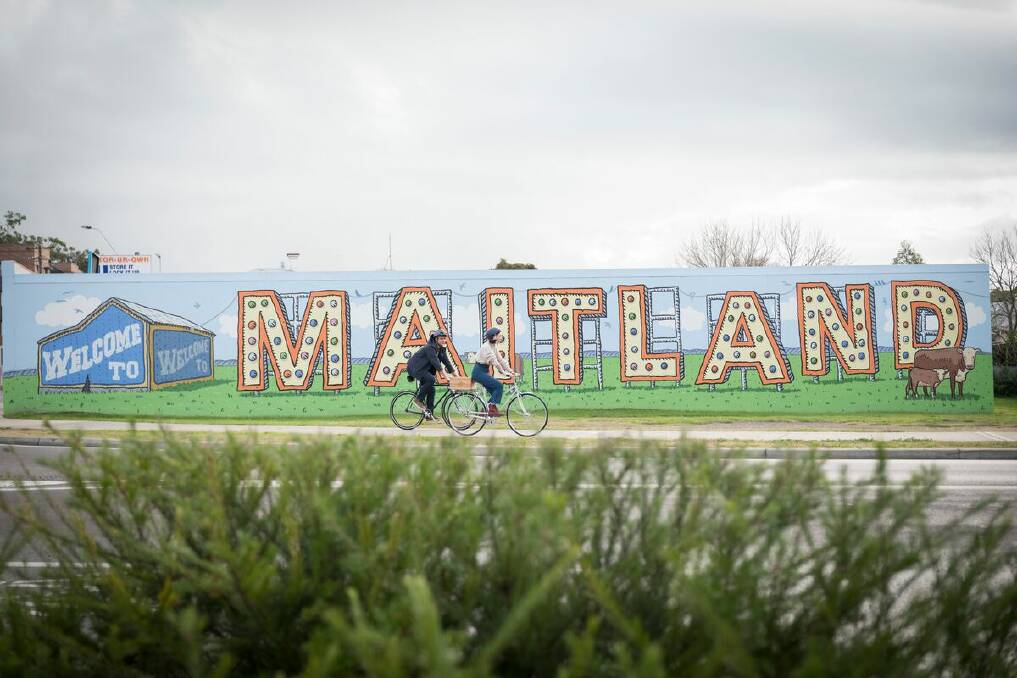 PUBLIC ART: Trevor Dickinson's 'Maitland' mural, pictured left, greets new visitors into the city. Picture: Supplied