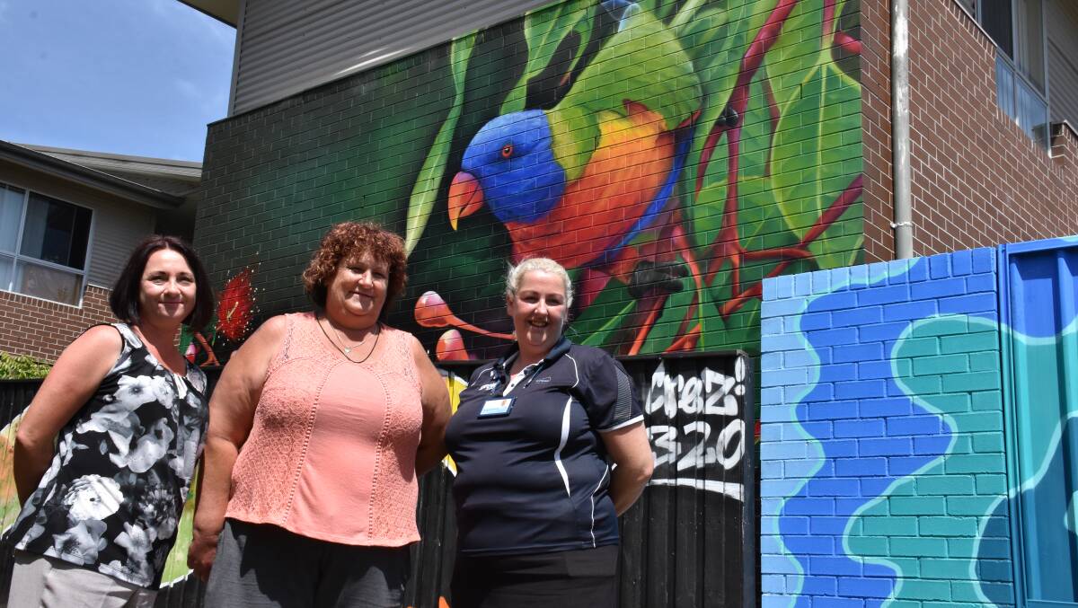 COLOUR: FACS senior commissioning and planning officer Rachel O'Connor, tenant Donna Wuellner and Compass Housing's Melissa Hope at the complex.