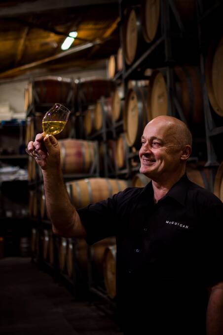 HAPPY DAYS: McGuigan's chief Hunter winemaker Peter Hall celebrates with the award winning 2007 Bin 9000 semillon. Picture: Simon McCarthy