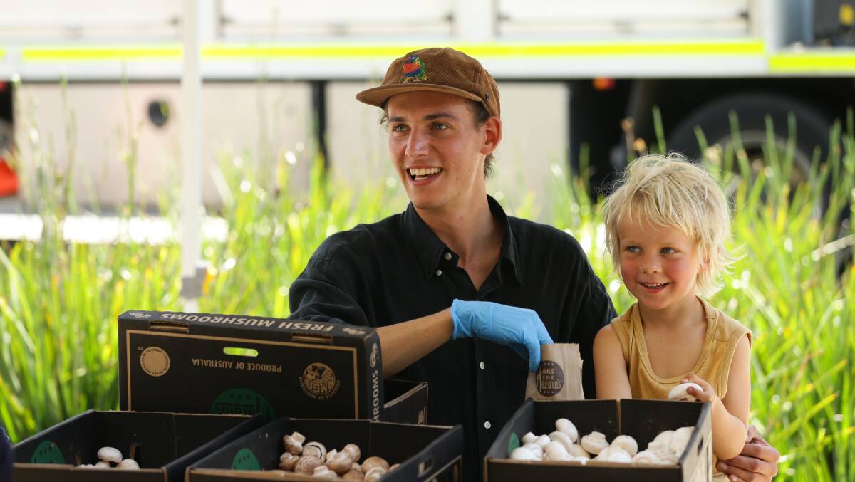 IN DEMAND: Woodie McClean and Blaise Foreman with Margin's Mushrooms at the Slow Food Earth Market in The Levee. Picture: Jonathan Carroll