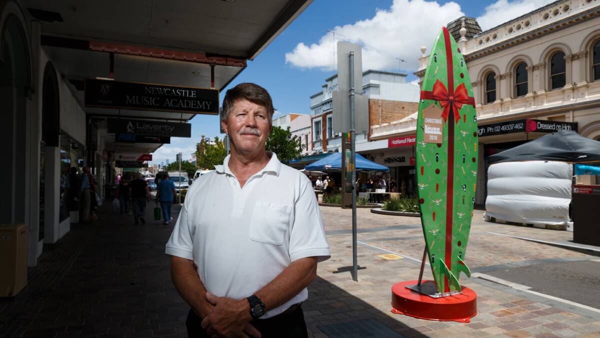 CHRISTMAS: Johnston's Shoes owner Michael Johnston believes Maitland Council hasn't done enough with Christmas decorations in The Levee. Picture: Max Mason-Hubers