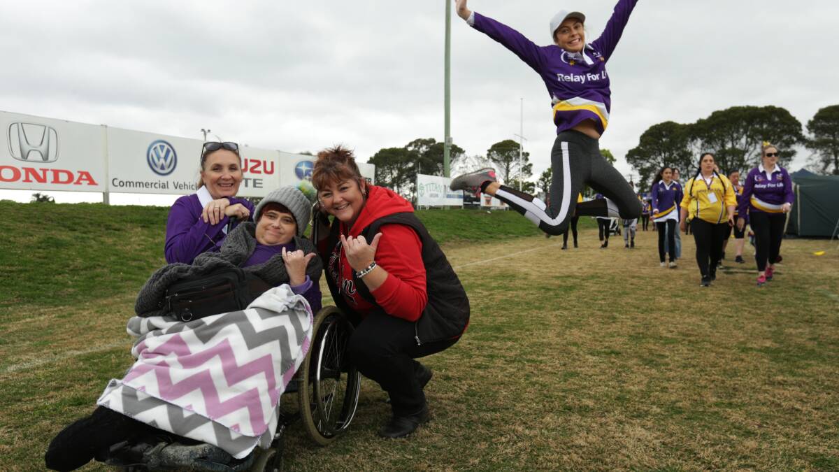 ALL SMILES: Steph Poole, Kaz Wilcher, Tanya Freeman with Madi Lawrence at Maitland Relay for Life on Saturday. Picture: Simone De Peak