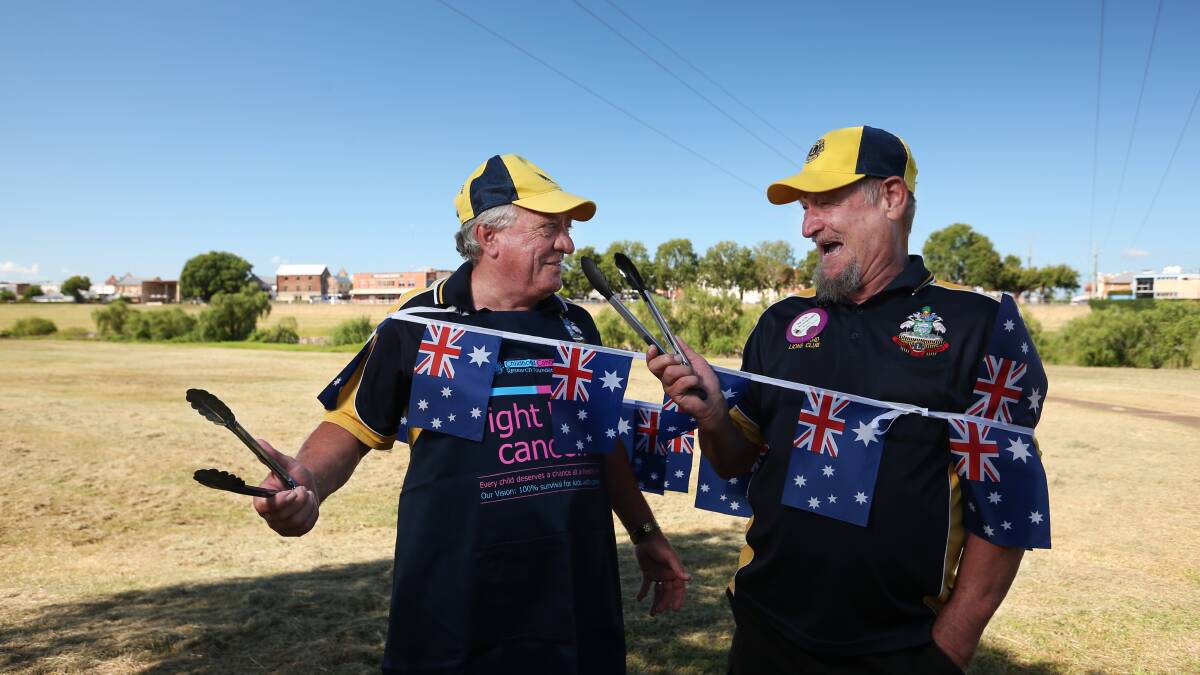 CELEBRATE: Maitland Lions members Geoff Kilmurray and Max Gruisinga will work the barbecue on Australia Day. Picture: Simone De Peak
