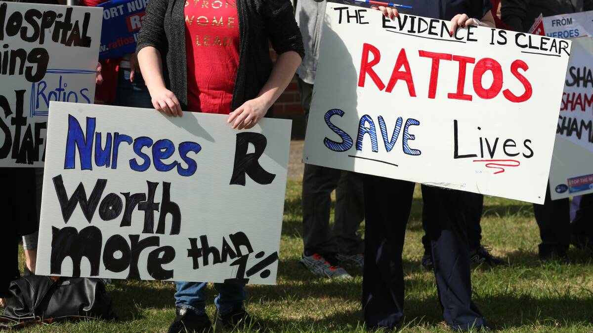 FRUSTRATION: Signs at the protest outside Maitland Hospital by frustrated nurses as part of a Hunter wide rally. 
