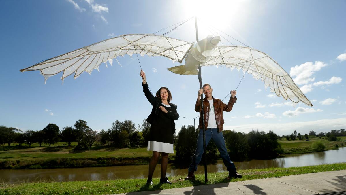 PUPPET: Maitland Mayor Loretta Baker with Curious Legends artistic director Mitchell Reese with his eagle bird puppet which will feature at Riverlights. Picture: Jonathan Carroll
