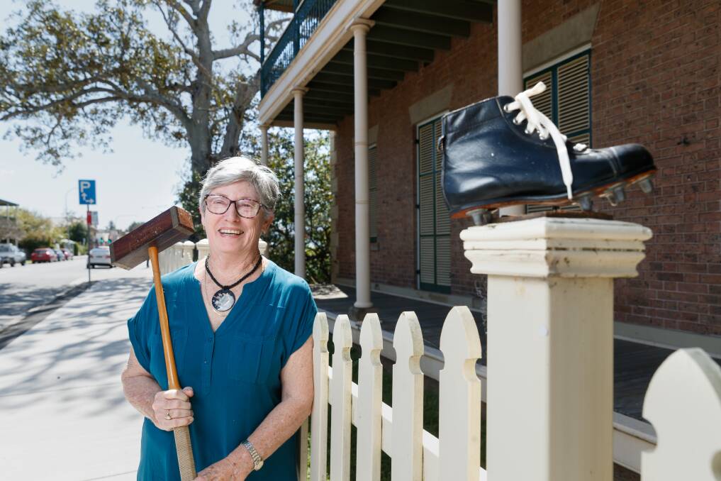 GOOD SPORT: Maitland Regional Museum president Janece McDonald with items from the new sport exhibit. Picture: Max Mason-Hubers