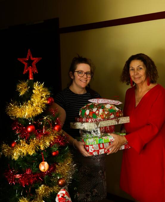 GIVING: Maitland Neighbourhood Centre manager Sarah Adams with mayor Loretta Baker at the centre, which will be giving gifts to those less fortunate in the community. Picture: Jonathon Carroll