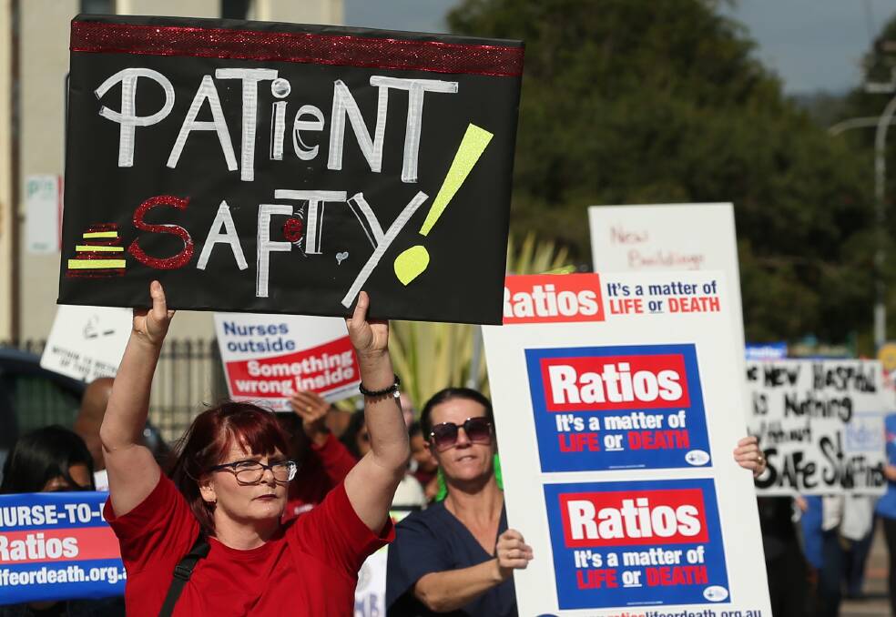 CALL OUT: More than 50 people attended the rally at Maitland Hospital on Wednesday. They were calling for improved ratios and better pay. 