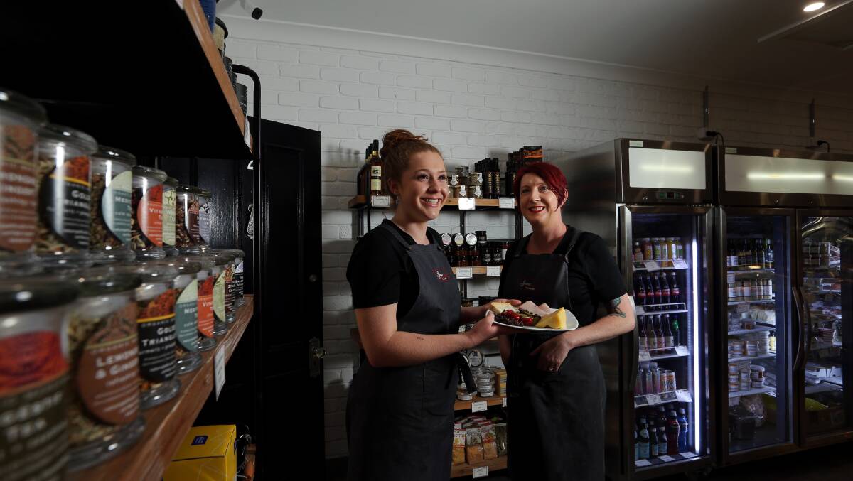 DELICIOUS: Belle McGavin with Sharon Bull owner of the Swan Street Deli & Larder in Morpeth which celebrated its first birthday earlier this month. Picture: Simone De Peak