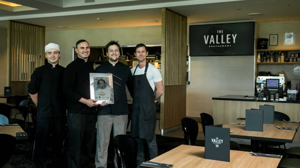 DINING: Valley Restaurant's William Bambey, Jordy Moffat, Benjamin Drivas and Mathew Woods with the silver award that the restaurant won this month. Picture: Marina Neil