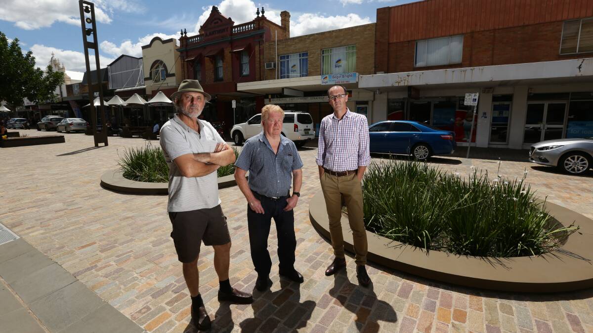 PARKING WOES: The Levee retailers Bob Dennerley, John Lee and Patrick Lane are frustrated by the lack of parking in the shared zone. Picture: Jonathan Carroll