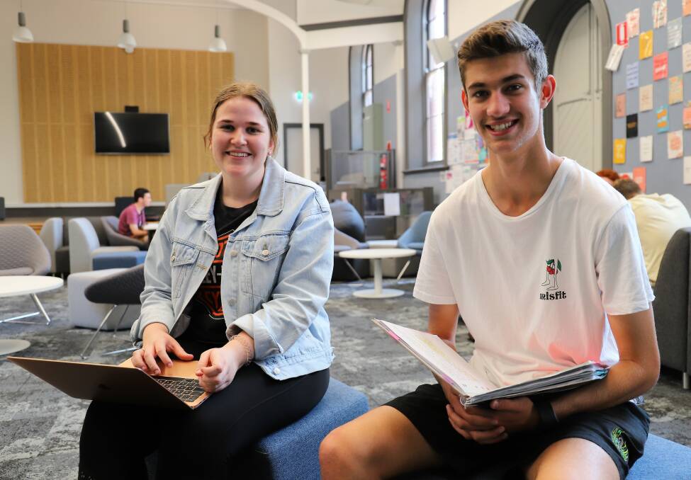 LIGHT AT END OF TUNNEL: All Saints Maitland College Year 12 students Annabelle Jones and Zach Butchard will sit the Higher School Certificate written exams starting Tuesday, October 20