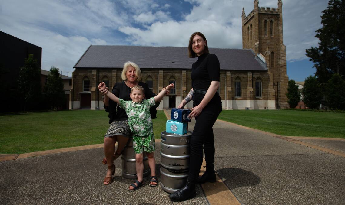 VIP EVENT: Rhonda Nyquist from PRD with her grandson Pethers and Maggie Kellehear from The Pourhouse on the lawns of St John the Baptist Chapel where a special VIP event will be held on New Year's Eve. Picture: Marina Neil