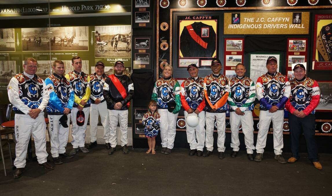 HUGE INTEREST: Drivers in last year's Indigenous Drivers Series gather in front of the J.C, Caffyn Wall at Menangle.
