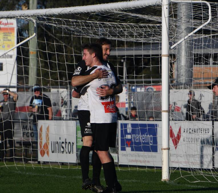 TEAM WORK: Joel Wood and James Thompson celebrate after Thompson tapped in a goal set up by Wood. Picture: Michael Hartshorn