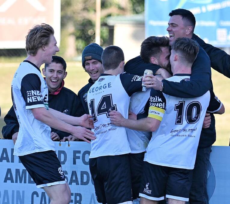 Maitland fans and players celebrate after Sean Pratt's goal in the Magpies' 5-1 Australia Cup win against the Weston Bears. Picture: A Nobody from Newy