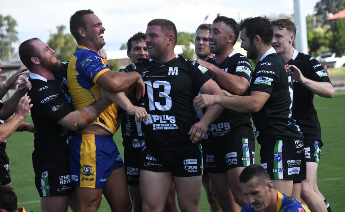 The Maitland Pickers celebrate after prop Jayden Butterfield busted through the Lakes defence to put the ball down on the try line. Picture by Michael Hartshorn