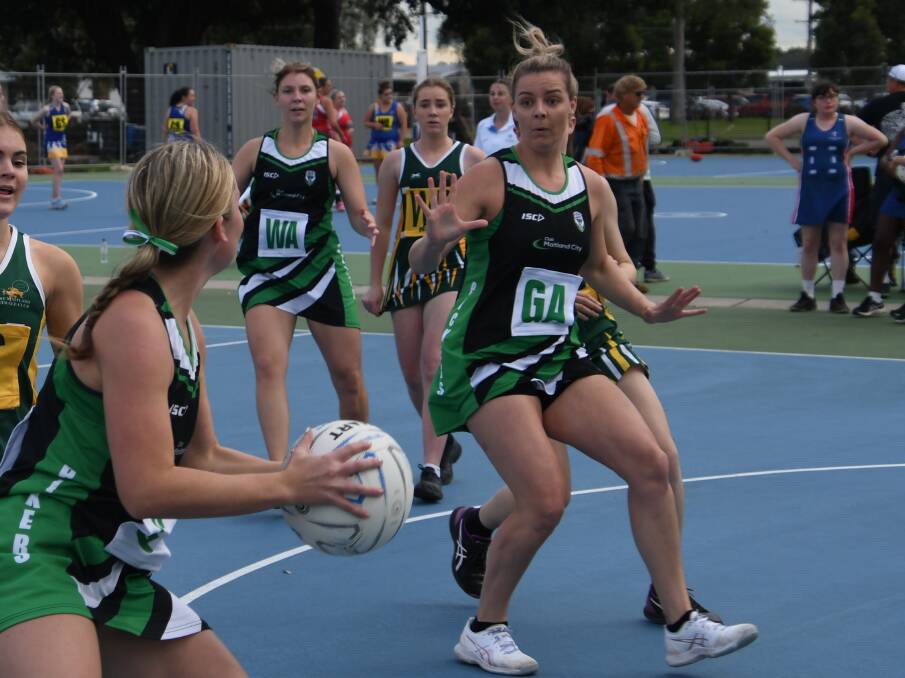 Centre Jess Mosman (pictured with the ball) and goal attack Karlee Grayson were among the best players for the Maitland Pickers. 